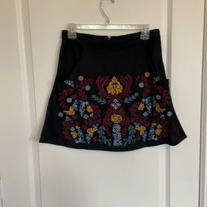 Black suede embroidered mini skirt sized medium